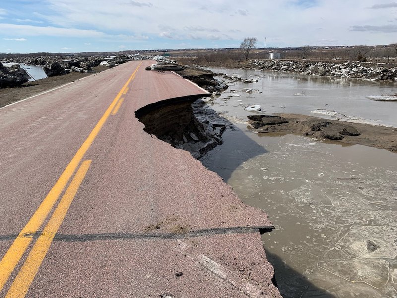 A damaged road is seen March 16