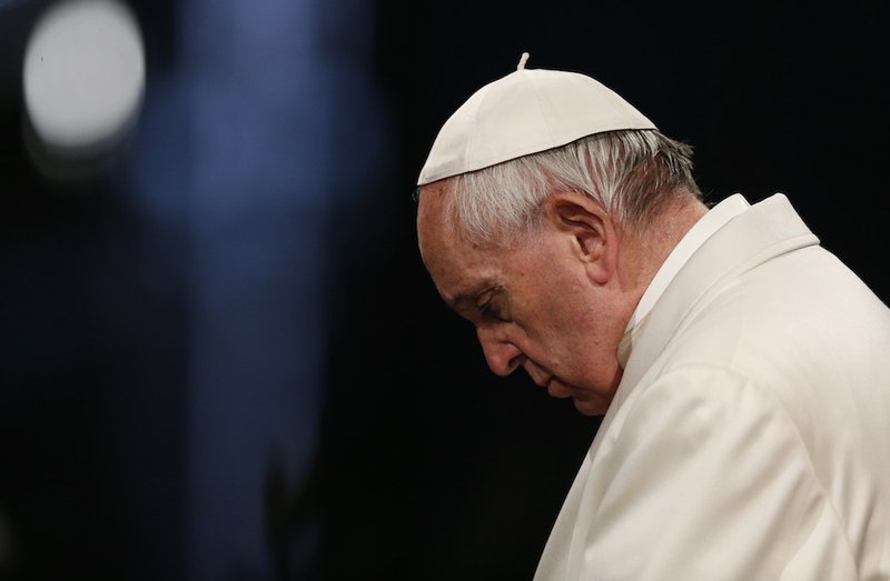 Pope Francis leads the Way of the Cross outside the Colosseum in Rome April 14. (CNS photo/Paul Haring)