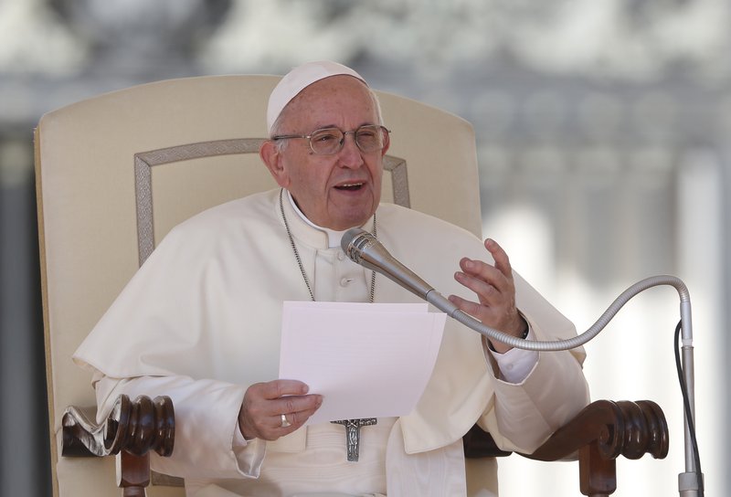Pope Francis speaks during his general audience in St. Peter's Square at the Vatican Sept. 12. (CNS photo/Paul Haring)
