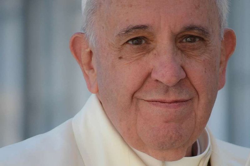 Pope Francis greets pilgrims in St. Peter's Square during the Wednesday general audience April 16