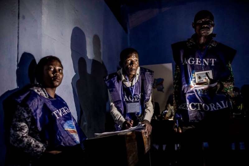 DRC polling officials hear instructions ahead of the nation’s Dec. 30 presidential elections. Credit: Luis Tato. AFP/Getty Images.