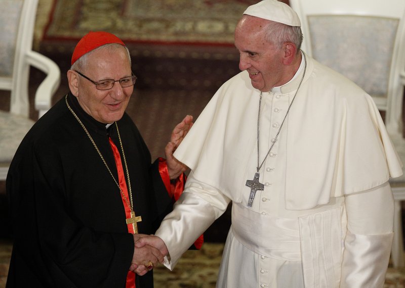 Pope Francis greets Chaldean Catholic Patriarch Louis Sako of Baghdad