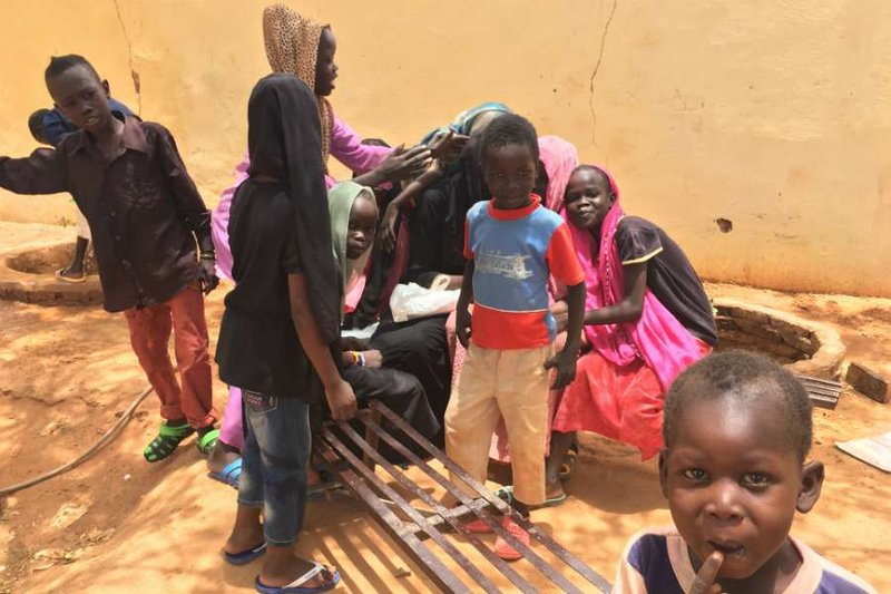 Children in the school yard at St. Kizito parish school in Dar El Salam