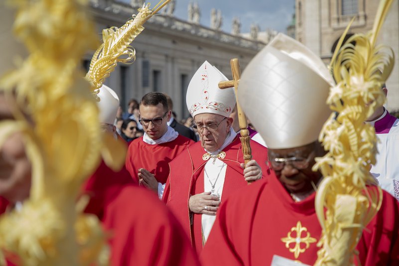 Pope Francis arrives to celebrate Palm Sunday Mass in St. Peter's Square at the Vatican April 14