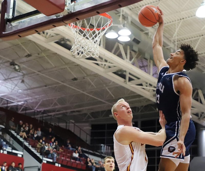 Freshman Dameane Douglas slams home two of his 16 points in LMU’s 69-61 win over Santa Clara on Jan. 26. (LMU ATHLETICS)