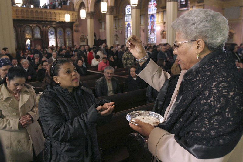 An extraordinary minister of holy Communion in Brooklyn