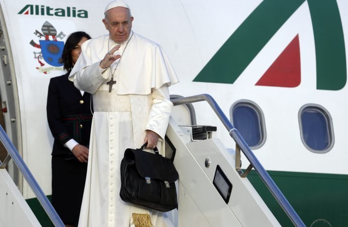Pope Francis boards the airplane on the occasion of a three-day trip to Bulgaria and Macedonia at Rome's Fiumicino International airport