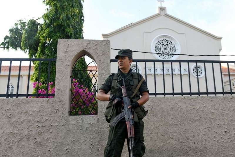 A Sri Lankan soldier stands guard outside St. Theresa’s church in Colombo on May 12