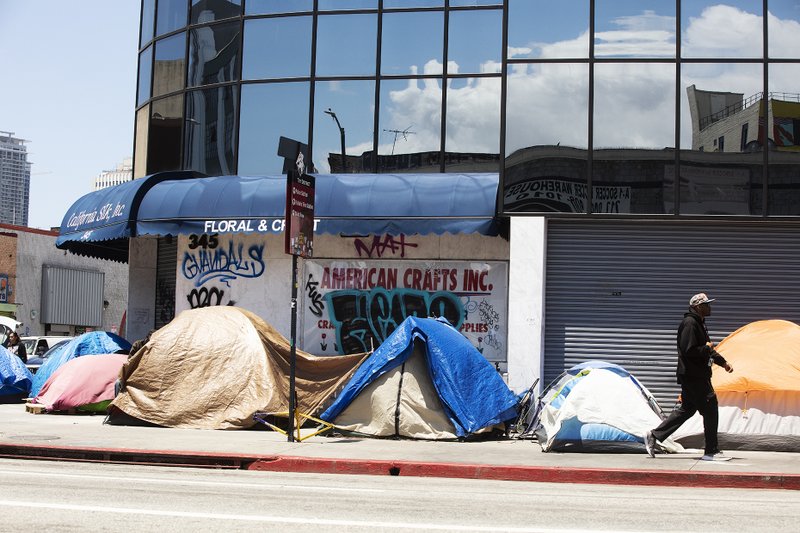 Growing homeless encampments on Skid Row often crowd out local businesses