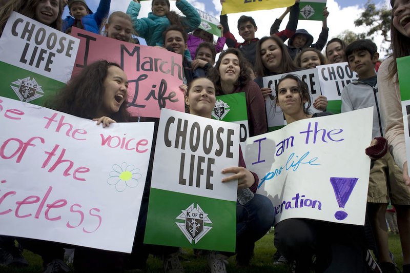 Young people participate in the annual Walk for Life in San Diego Jan. 20. A report released Nov. 21 by the Centers for Disease Control and Prevention says fewer U.S. women are having abortions than at any time since Roe v. Wade. (CNS photo/David Maung)