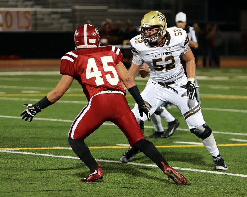 St. Francis’ Matthew Barriga (52) prepares to level a ball carrier in this photo from a 2016 game. The All-Angelus League senior lineman is a key member of the Golden Knights. (Courtesy of St. Francis High School)