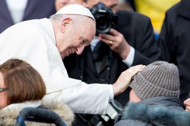 Pope Francis greets people with disabilities following the General Audience on Nov. 15