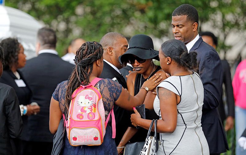 Family members comfort Diamond Reynolds