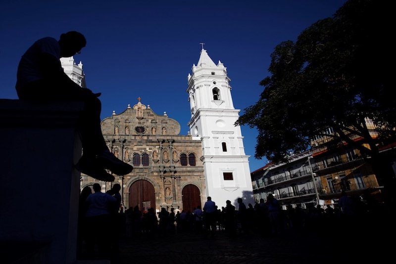 People attend the christening ceremony of the new bells of the Cathedral Basilica of St. Mary Nov. 24 in Panama City. Archbishop Jose Domingo Ulloa Mendieta of Panama spoke during the ceremony for the new eight bells and the opening of the renovated cathedral