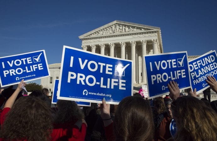 Pro-life advocates gather near the U.S. Supreme Court during the annual March for Life in Washington Jan. 19