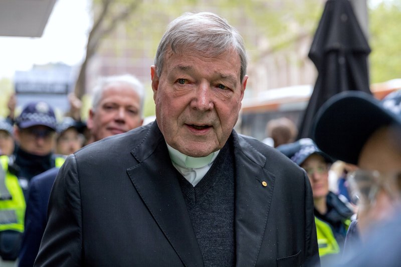 Australian Cardinal George Pell leaves the Melbourne Magistrates Court Oct. 6. (CNS photo/Mark Dadswell