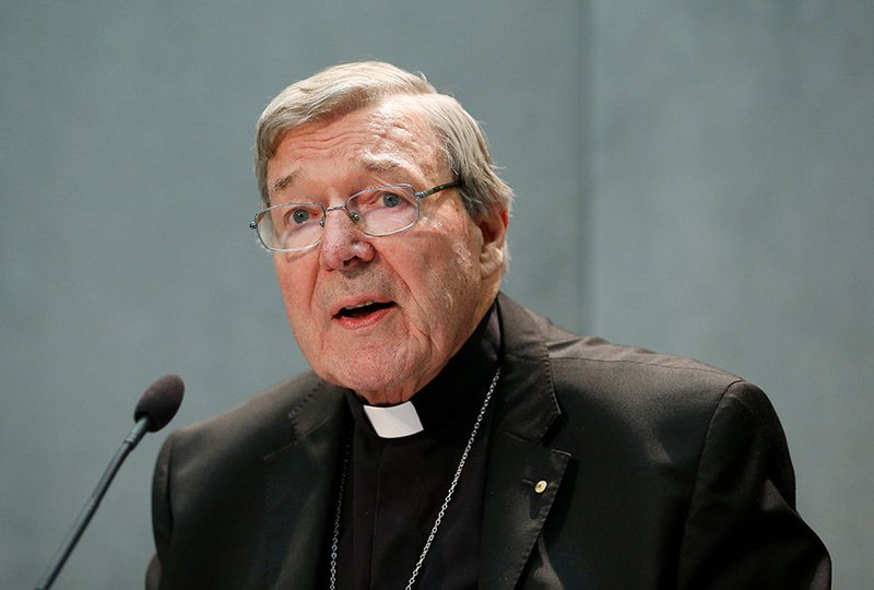 Australian Cardinal George Pell delivers a statement in the Vatican press office June 29. Speaking after Australian authorities filed sexual abuse charges against him