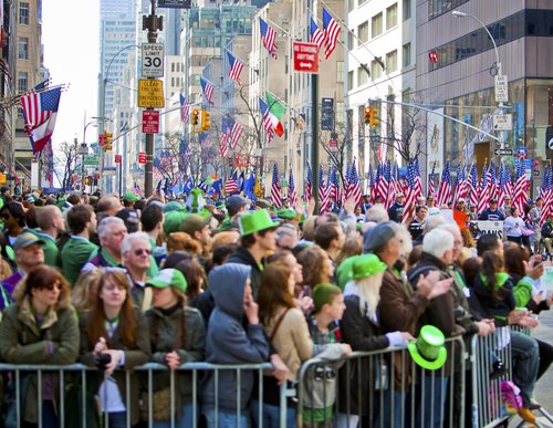 Crowds of people gather to celebrate at the St. Patrick's Day Parade on March 17