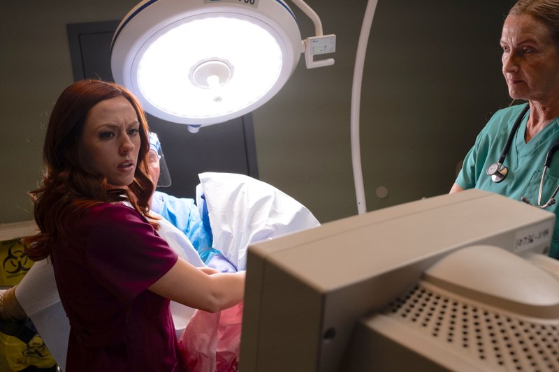 Ashley Bratcher (left) portrays Abby Johnson assisting in an ultrasound-guided abortion. (COURTESY "UNPLANNED")