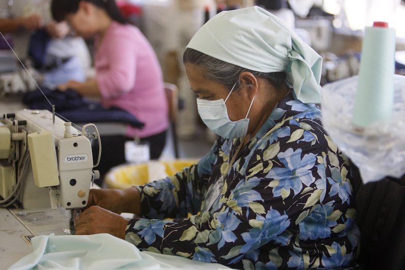 An immigrant from Mexico works at an apparel factory in downtown Los Angeles. The Catholic Campaign for Human Development has made grants to benefit a worker-owned sewing cooperative