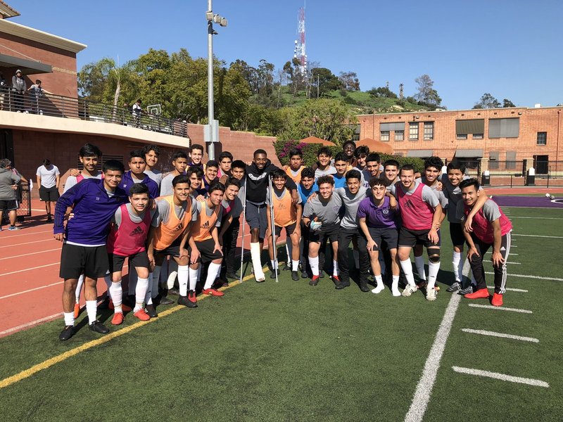 Cathedral boys' soccer team poses after a practice (PHOTO COURTESY PHANTOM SOCCER TWITTER)