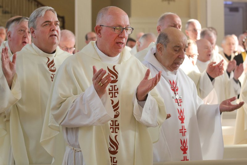 U.S. bishops pray during Mass in the Chapel of the Immaculate Conception at Mundelein Seminary Jan. 3 at the University of St. Mary of the Lake in Illinois