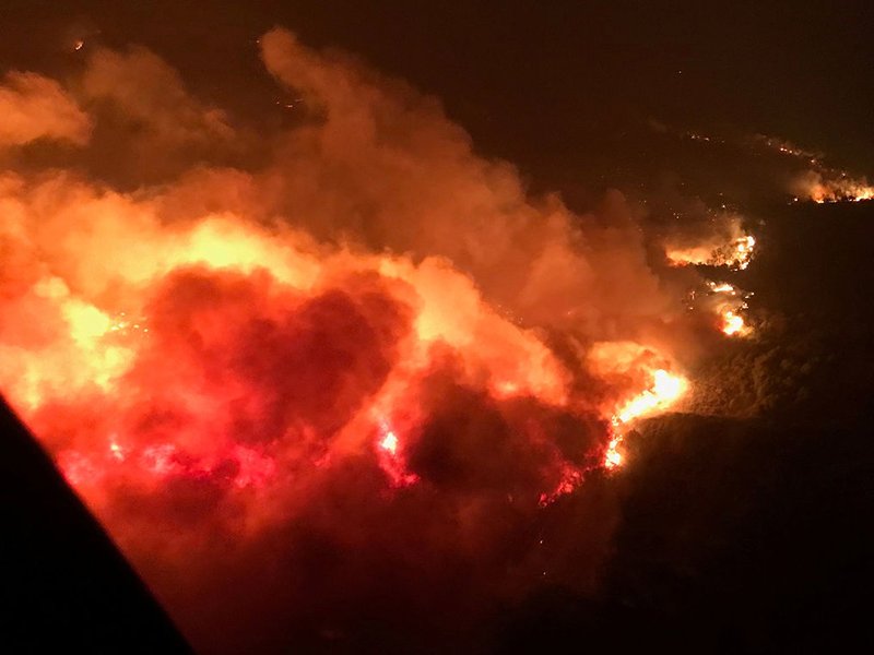 A wildfire is seen near Atlas Road in Napa