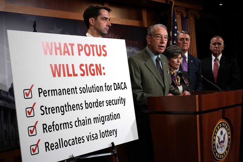U.S. Sen. Chuck Grassley (R-IA) (2nd L) speaks as (L-R) Sens. Tom Cotton (R-AR)