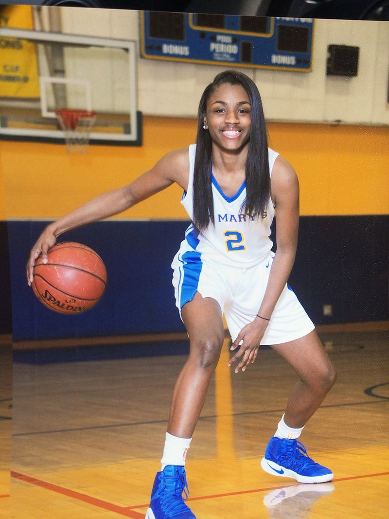 Basketball is just one of the activities filling the life of St. Mary’s Academy honor student Retha Little. She also volunteers at church and in the community. (photo courtesy St.Mary's Academy)