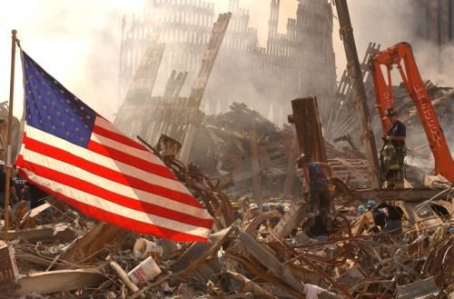 FEMA Urban Search and Rescue teams work to clear rubble and search for survivors at the World Trade Center site on Sept 17