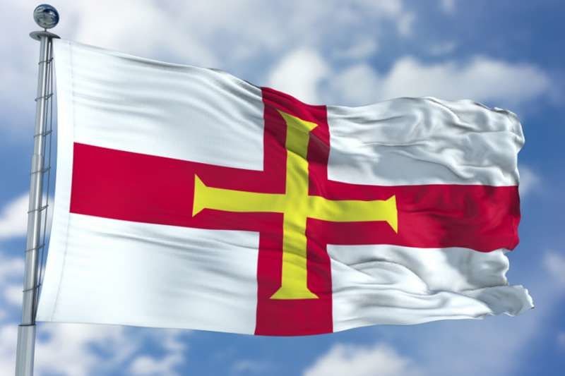 The flag of Guernsey. Credit: memodji/Shutterstock.
