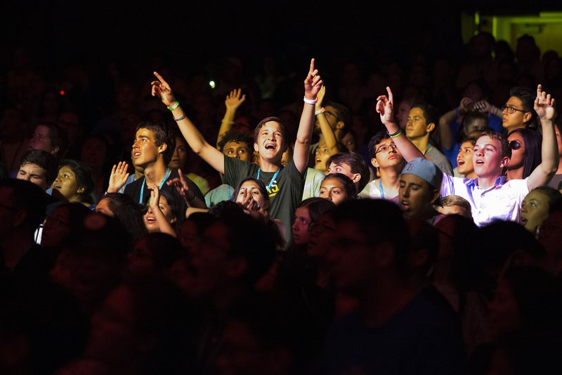 Young Catholics rejoice in song Aug. 4 during the third annual City of Saints youth conference in Los Angeles. The Archdiocese of Los Angeles Office of Religious Education hosted the three-day event on the campus of University of California