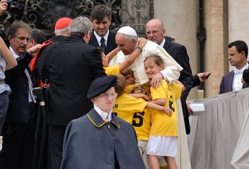 Pope Francis greets children during his General Audience June 25