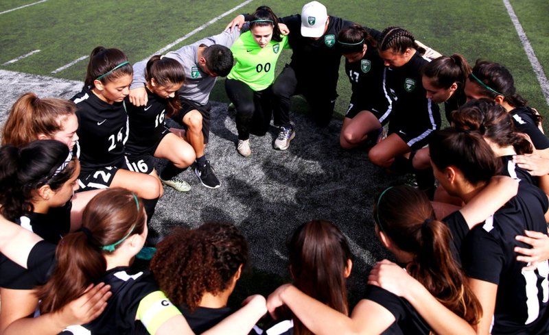 San Gabriel Mission High School girls' soccer team prays before a game. (Photo courtesy of SGMHS.org) 