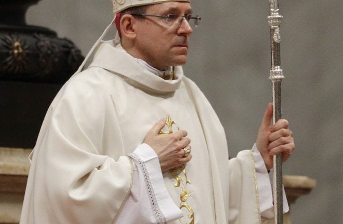 Newly ordained bishop Waldemar Stanislaw Sommertag stands as Pope Francis celebrates a mass during which he conferred the ordination to 3 bishops in St. Peter's Basilica at the Vatican
