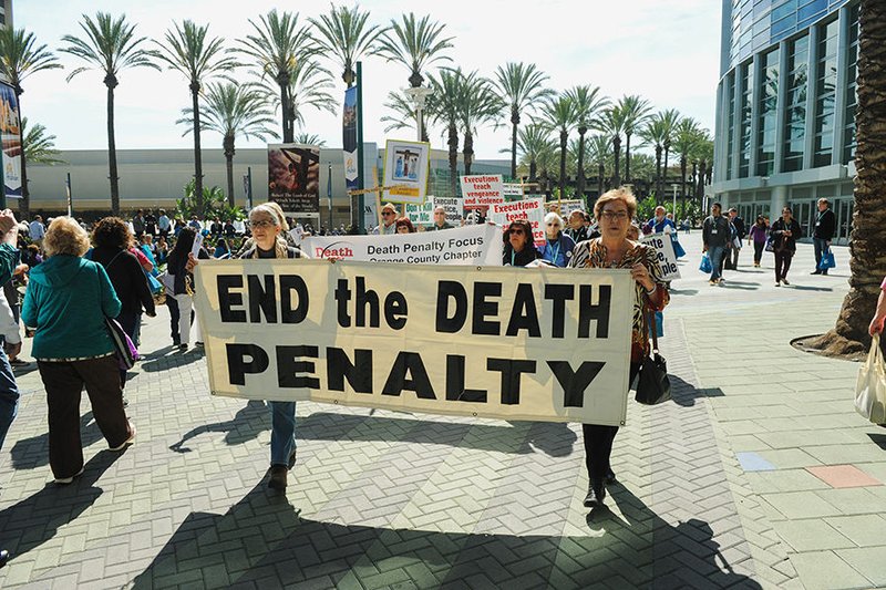 Demonstrators march during a Feb. 25 rally organized by Catholics Against the Death Penalty-Southern California during the four-day 2017 Religious Education Congress in Anaheim