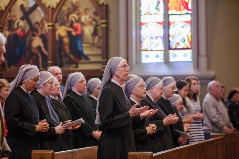 Members of the Little Sisters of the Poor pray during Mass in 2011 at the Basilica of the Sacred Heart at the University of Notre Dame in Indiana. The Little Sisters of the Poor were in federal court Oct. 19 defending themselves in a new lawsuit by California Attorney General Xavier Becerra