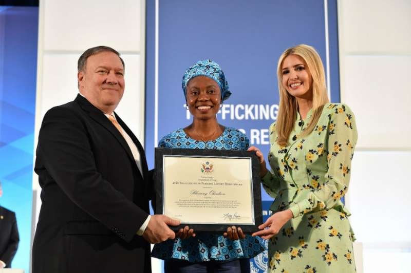 Blessing Okoedion (C) accepts a Trafficking in Persons Hero award from US Secretary of State Mike Pompeo and presidential advisor Ivanka Trump. Credit: State Department / Public Domain.