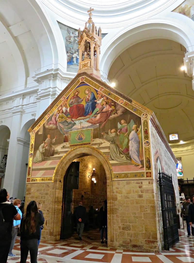 The Porciuncula Church rebuilt by St. Francis more than 800 years ago is housed inside the Basilica of Santa Maria degli Angeli in Assisi. (MIKE NELSON/ANGELUS NEWS)
