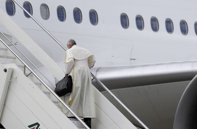 Pope Francis boards the airplane for Abu Dhabi