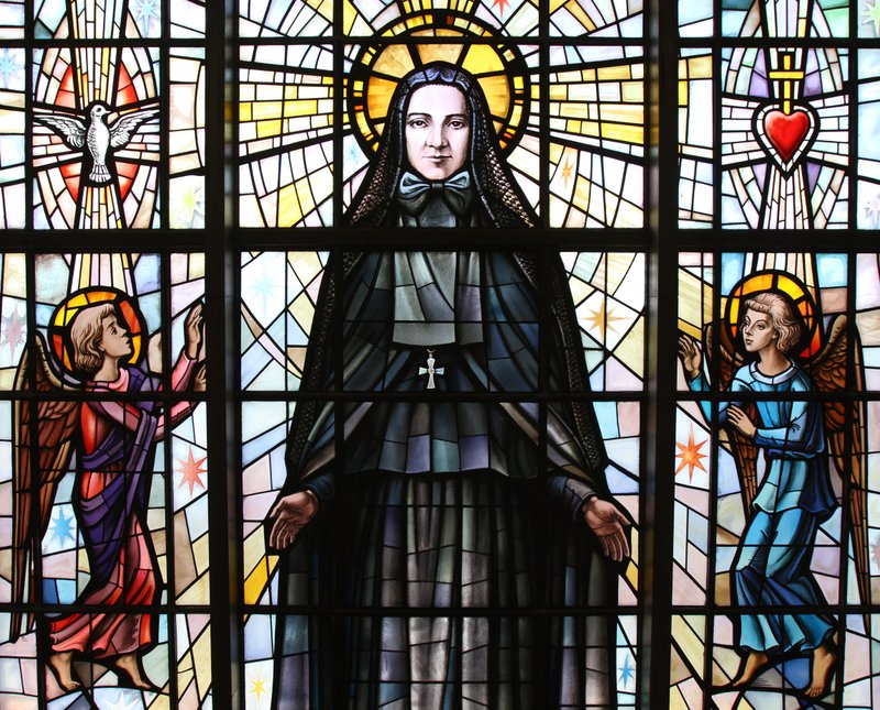 St. Frances Xavier Cabrini is depicted in a stained-glass window at the saint's shrine chapel in the Washington Heights section of New York City. (CNS PHOTO/GREGORY A. SHEMITZ)