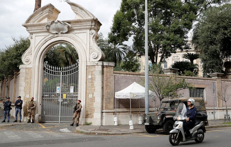 Italian Army and police officers stand in front of the apostolic nunciature to Italy in Rome where workers discovered human bones during a reconstruction project. Italian media immediately raised the possibility that they could be the remains of a Vatican employee's daughter who was kidnapped 35 years ago at the age of 15. A forensic examination of the bones is underway