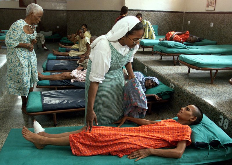 A member of the Missionaries of Charity cares for a critically ill patient at Nrimal Hriday home for the dying opened in 1952 by St. Teresa of Kolkata in India. In his message for the World Day of the Sick