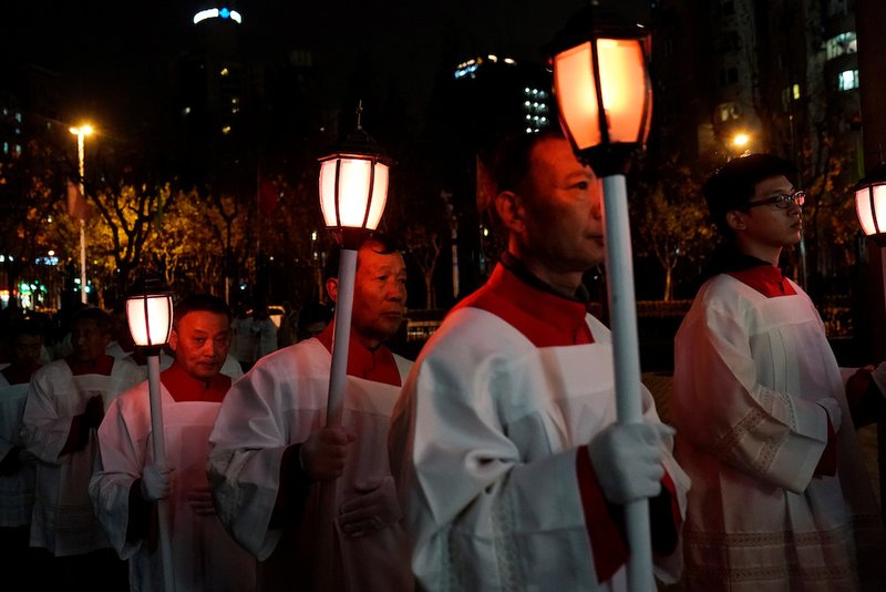 Chinese Catholics attend a Christmas Eve Mass in in Shanghai Dec. 24