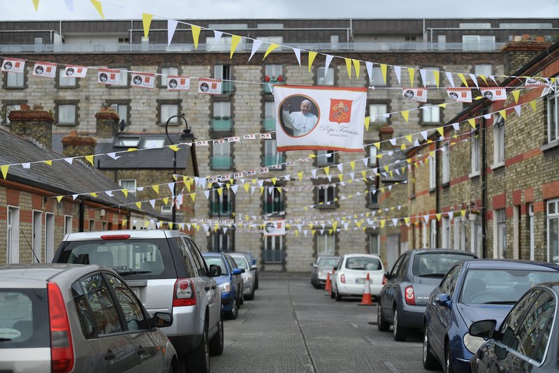A banner with an image of Pope Francis decorates a street Aug. 13 in Dublin. Pope Francis will visit Dublin and Knock Aug. 25-26
