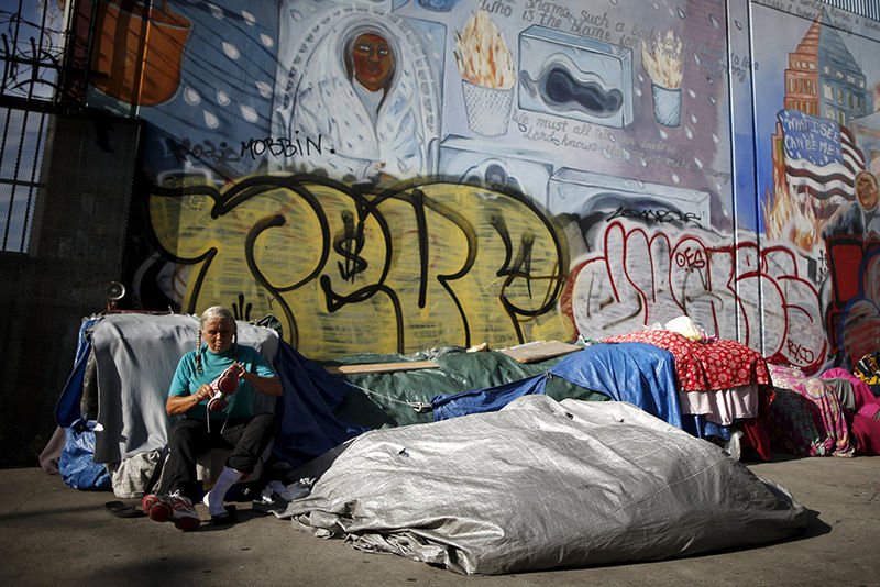 A woman sits outside her tent on Skid Row in downtown Los Angeles Oct. 2015. (CNS photo/Lucy Nicholson