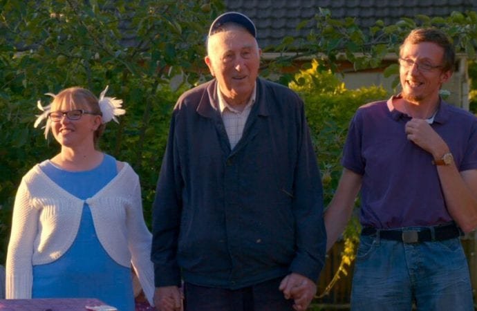 Jean Vanier with some of the residents of the L'Arche community. (Summer in the Forest publicity still via Crux)