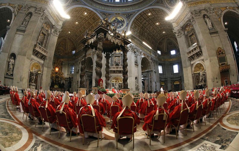 Cardinals from around the world attend a Mass for the election of the Roman pontiff in St. Peter's Basilica at the Vatican in 2013. (CATHOLIC NEWS SERVICE/STEFANO RELLANDINI