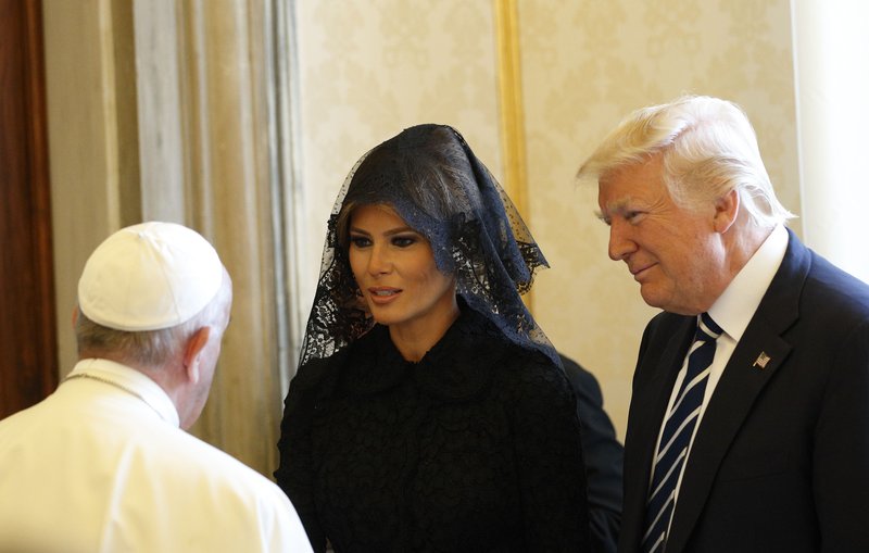Pope Francis talks with U.S. President Donald Trump and his wife