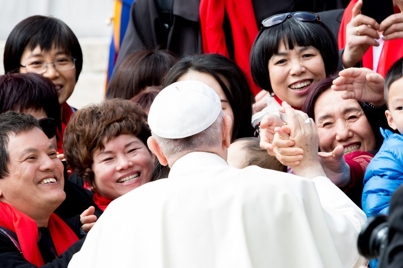 Pope Francis greets the faithful at his general audience in St. Peter’s Square on April 18